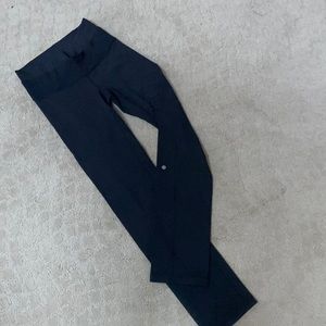 Black, wide legged lululemon high wasted leggings